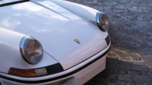 White Porsche 911 Carrera S front with badge - Forza Horizon 5