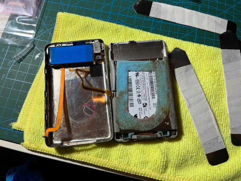 Original hard drive and battery inside iPod classic