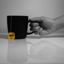 Hand holding cup